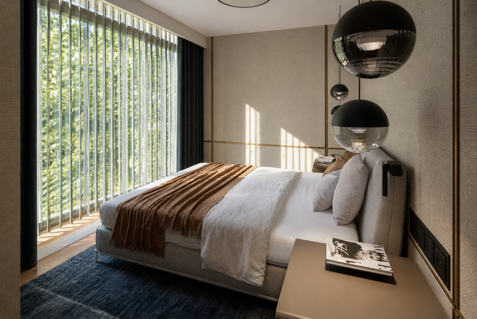 Main bedroom with warm brown bed textile and full-height window