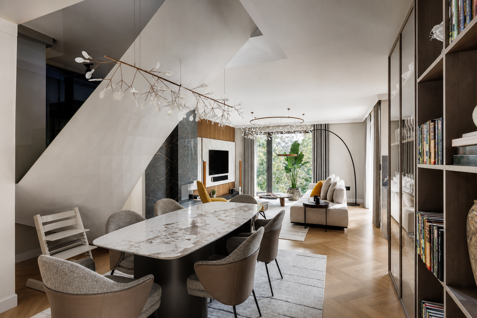 Dining area with sculptural table, stairs and built-in shelving